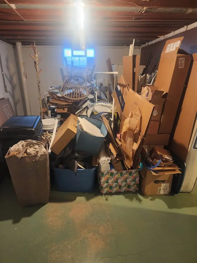 Roll-off dumpster container at job site for 20 Yard Dumpster Rental in Deep River